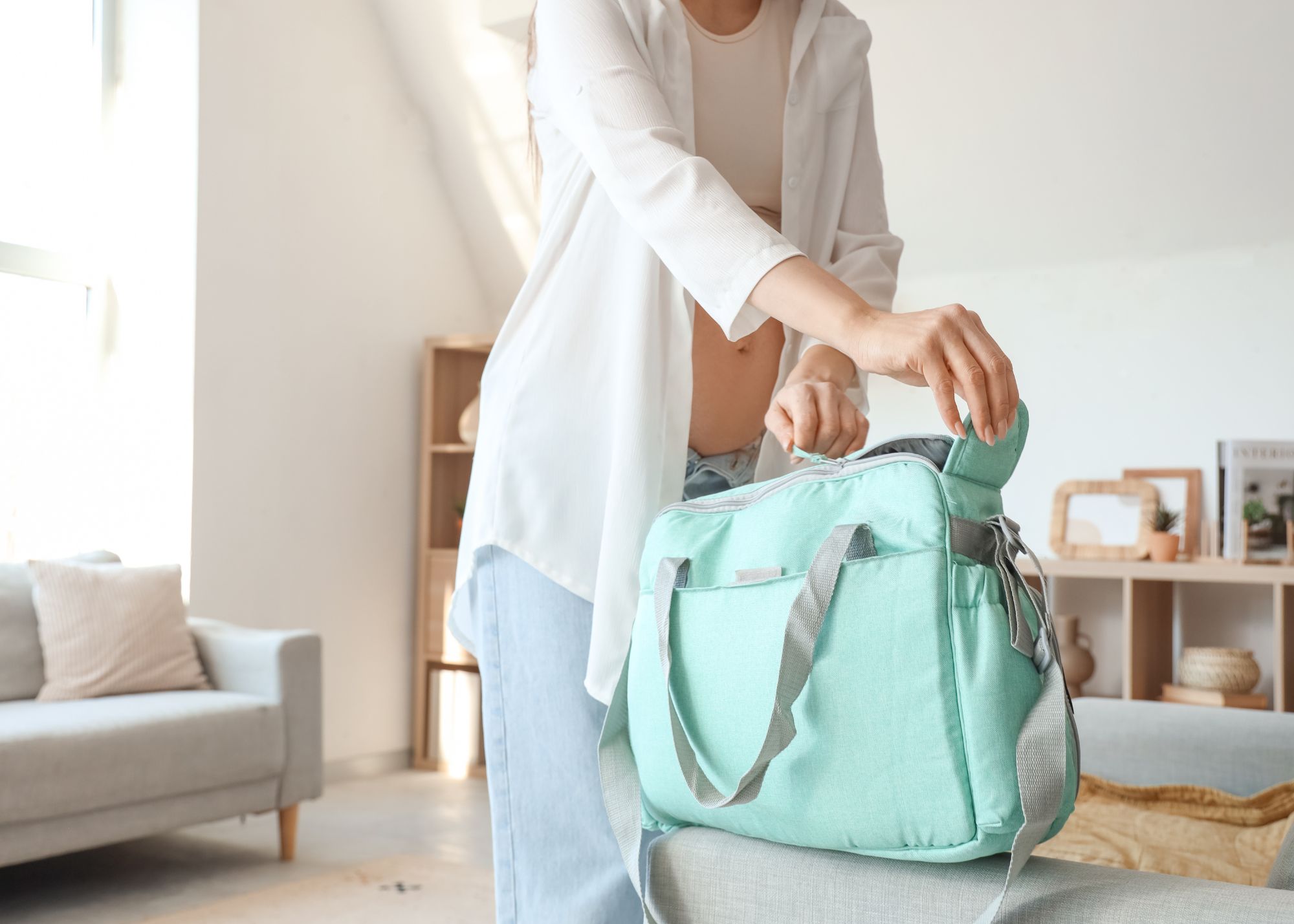 pregnant mom packing a bag for the hospital to give birth in columbia sc