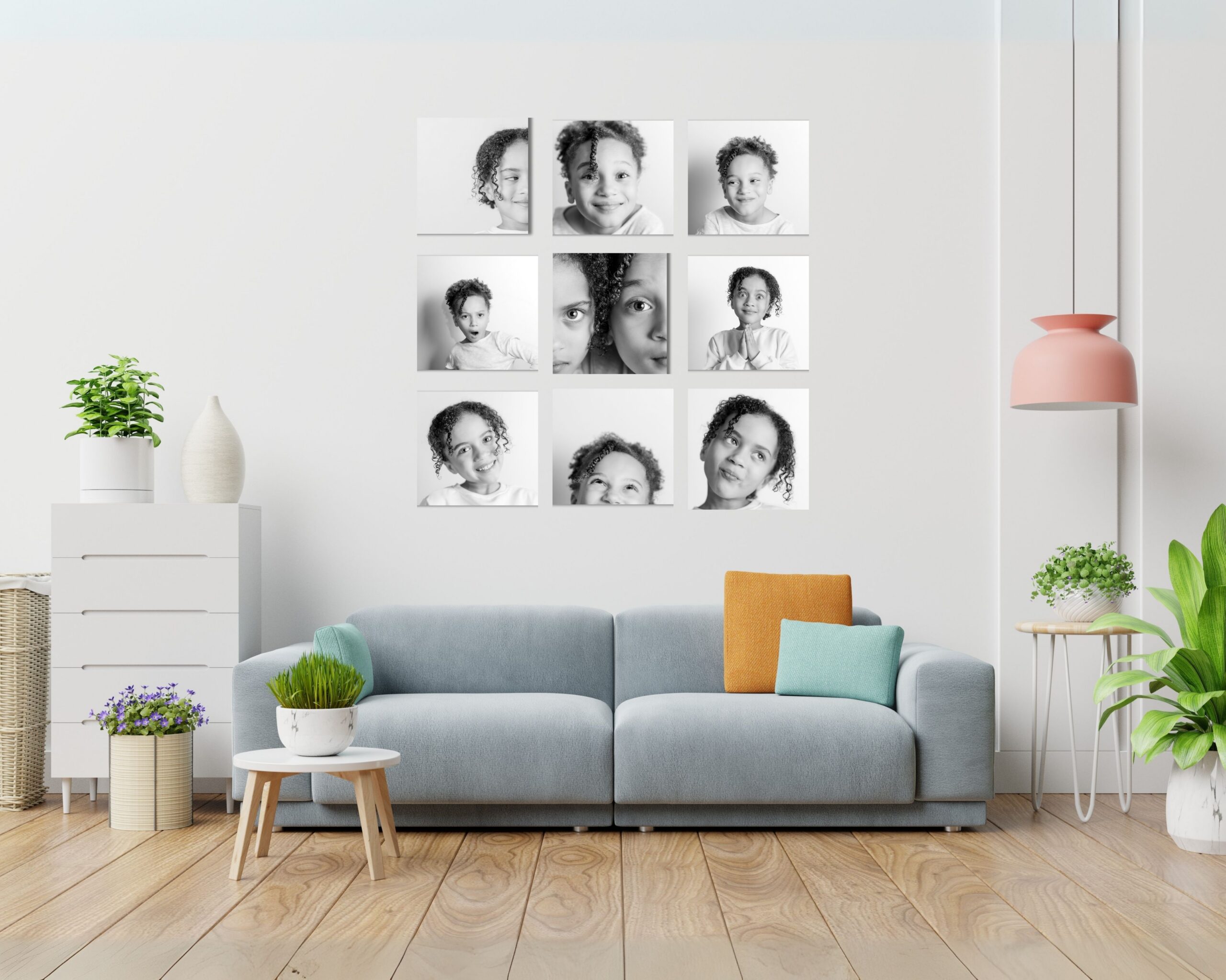 Framed grid of black and white child personality portraits displayed as wall art in a modern home